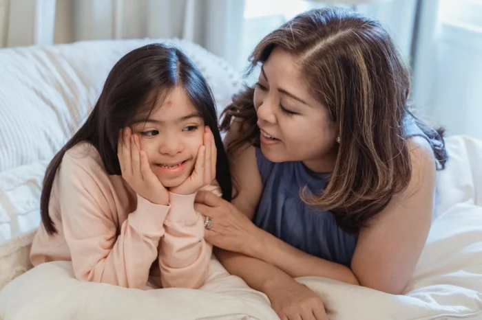 Abacus Therapies - How to Explain Autism to Kids - Mother Talking to a Daughter with Autism
